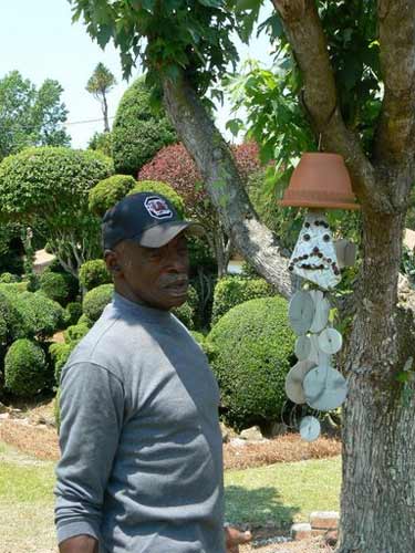 Fryar Shows Off His Pot Head Hanging Sculpture